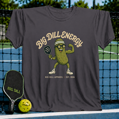 Dark grey unisex t-shirt featuring a pickle mascot with sunglasses, visor, and paddle, with Big Dill Energy text.