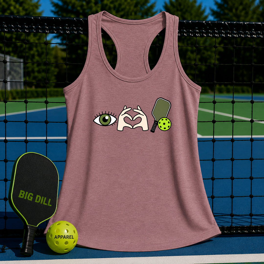 Mauve racerback tank with an eye, heart hands, and pickleball graphic, displayed on a pickleball court net.
