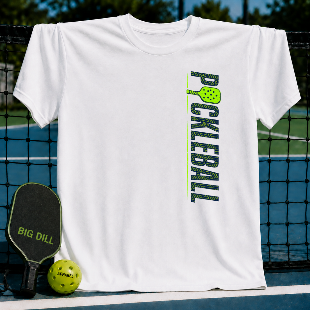 White unisex t-shirt featuring a vertical green and navy stacked Pickleball graphic with a paddle on a court background.