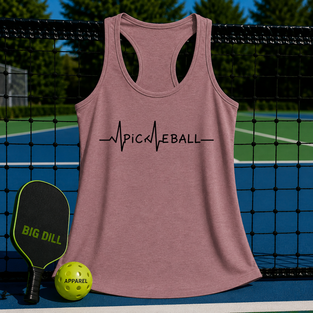 Dusty rose racerback tank top with a black Pickleball EKG heartbeat graphic, displayed on a pickleball court.