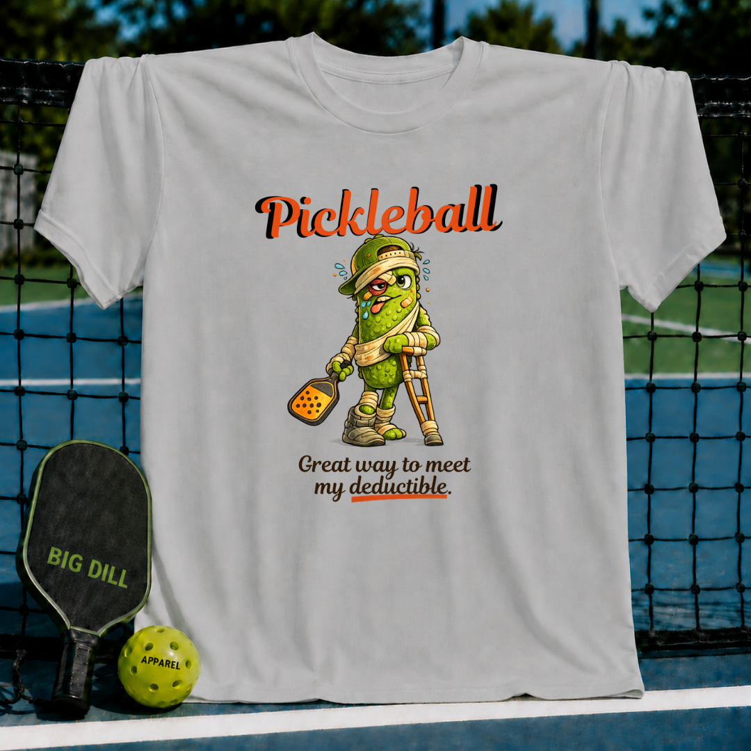 Light gray unisex t-shirt featuring a cartoon pickle on crutches with a pickleball paddle and funny injury-themed text.