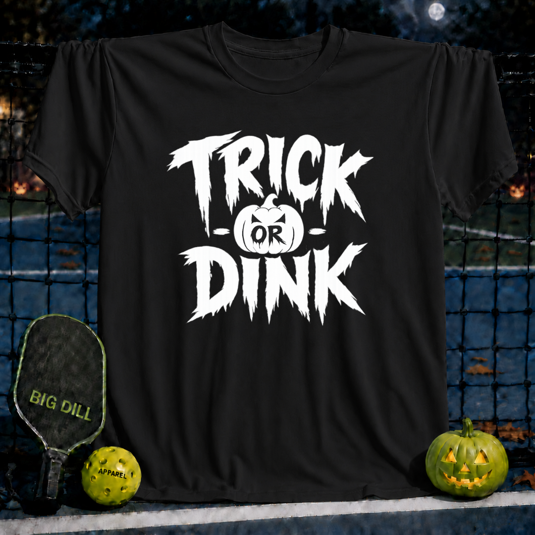 Black unisex Trick-or-Dink pickleball t-shirt with white spooky text and pumpkin graphic on a court background.