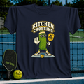 Navy blue crewneck t-shirt featuring a cartoon pickle wearing sunglasses and holding a No Step pickleball paddle.