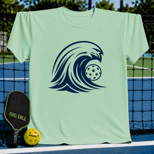 Mint green unisex t-shirt featuring a bold navy blue wave graphic with a pickleball inside on a pickleball court.
