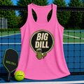 Pink racerback tank top with a retro Big Dill pickle graphic, displayed on a pickleball court with a paddle and ball.