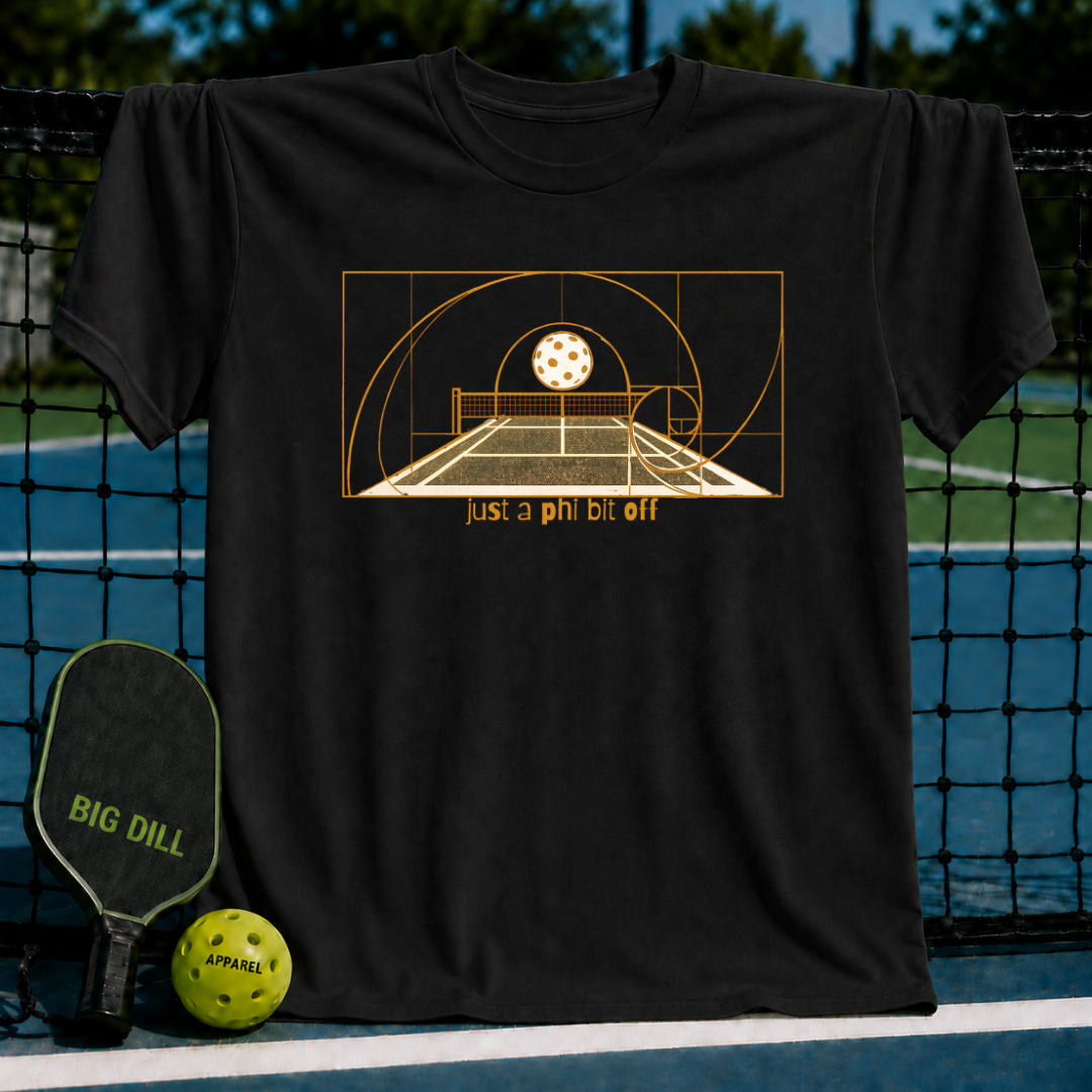 Navy unisex t-shirt featuring a gold Fibonacci spiral pickleball court graphic and the text just a phi bit off.