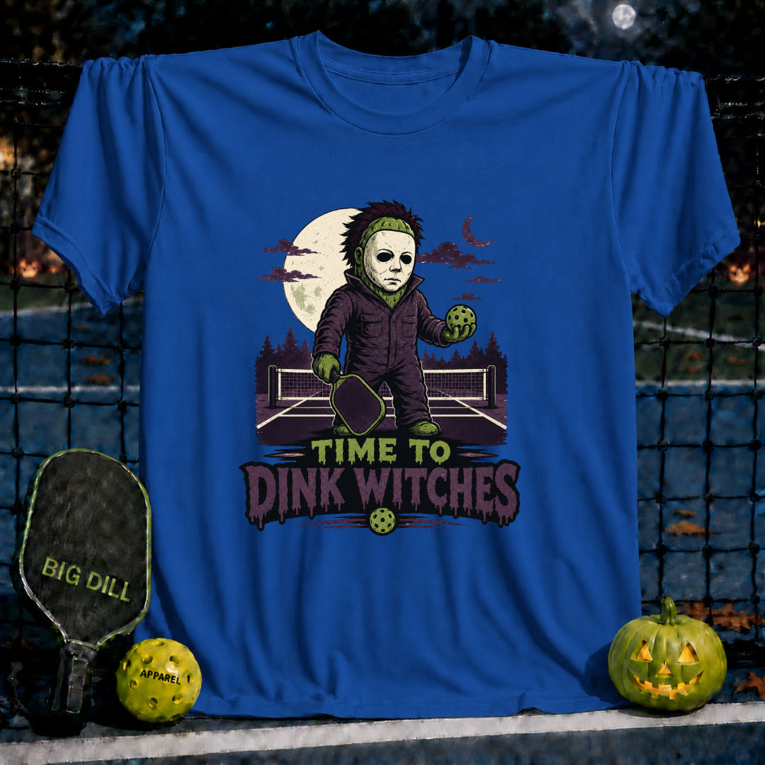 Royal blue unisex t-shirt featuring a spooky pickleball-playing character and the text Time to Dink Witches.