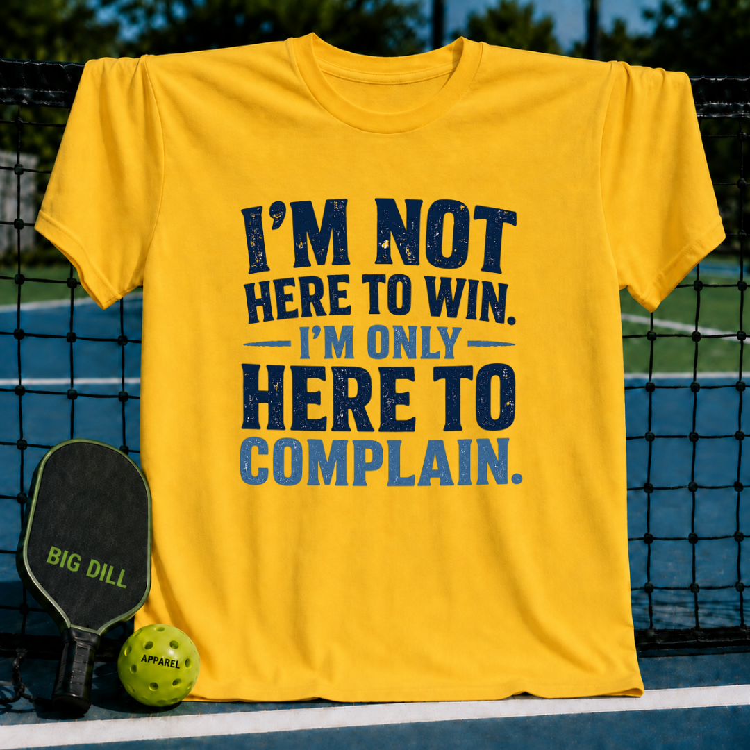 Bright yellow unisex t-shirt featuring distressed navy blue text that reads I'm Not Here To Win, I'm Only Here To Complain.
