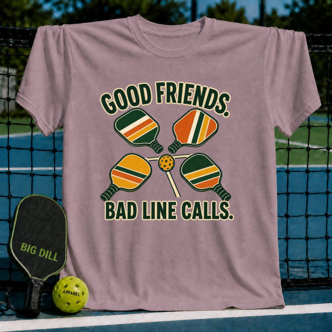 Mauve crewneck t-shirt featuring a retro pickleball graphic with four paddles, a ball, and the text Good Friends Bad Line Calls.