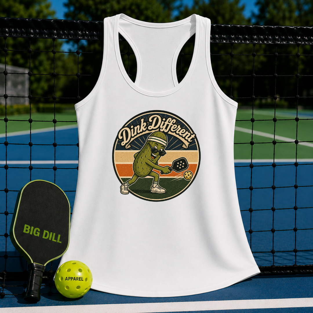 White racerback tank with a retro pickleball graphic featuring a pickle character on a pickleball court background.