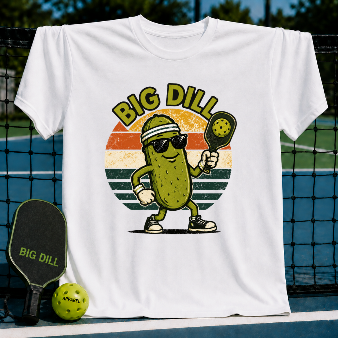 White unisex t-shirt featuring a retro pickleball graphic of a cool pickle wearing sunglasses and holding a paddle.