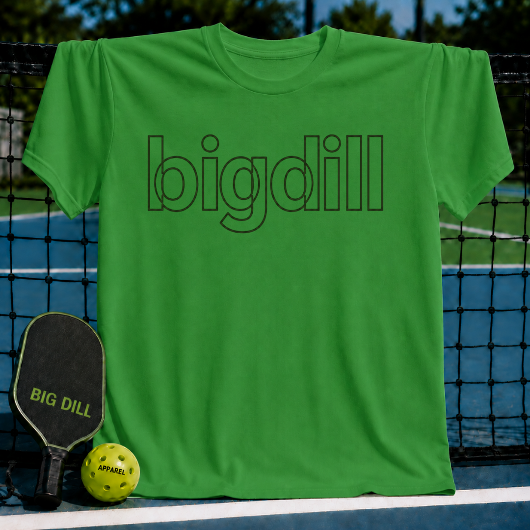 Bright green Big Dill unisex t-shirt with a black outline wordmark graphic, displayed on a pickleball court net.