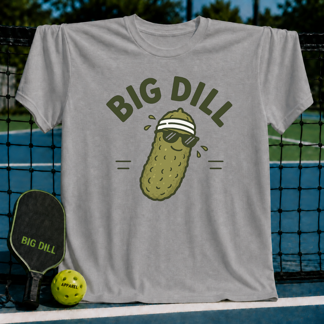 Light gray unisex pickleball t-shirt featuring a graphic of a cool pickle wearing sunglasses and a sweatband.