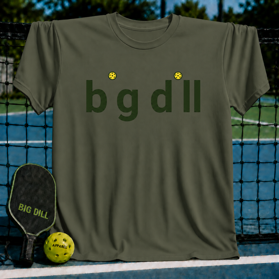 Olive green unisex t-shirt featuring a minimalist Big Dill wordmark with yellow pickleball icons as the dots over the i's.