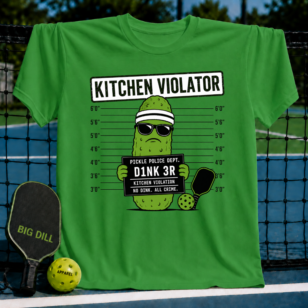 Bright green crewneck t-shirt featuring a pickle mug shot graphic with sunglasses, a headband, and a pickleball court backdrop.