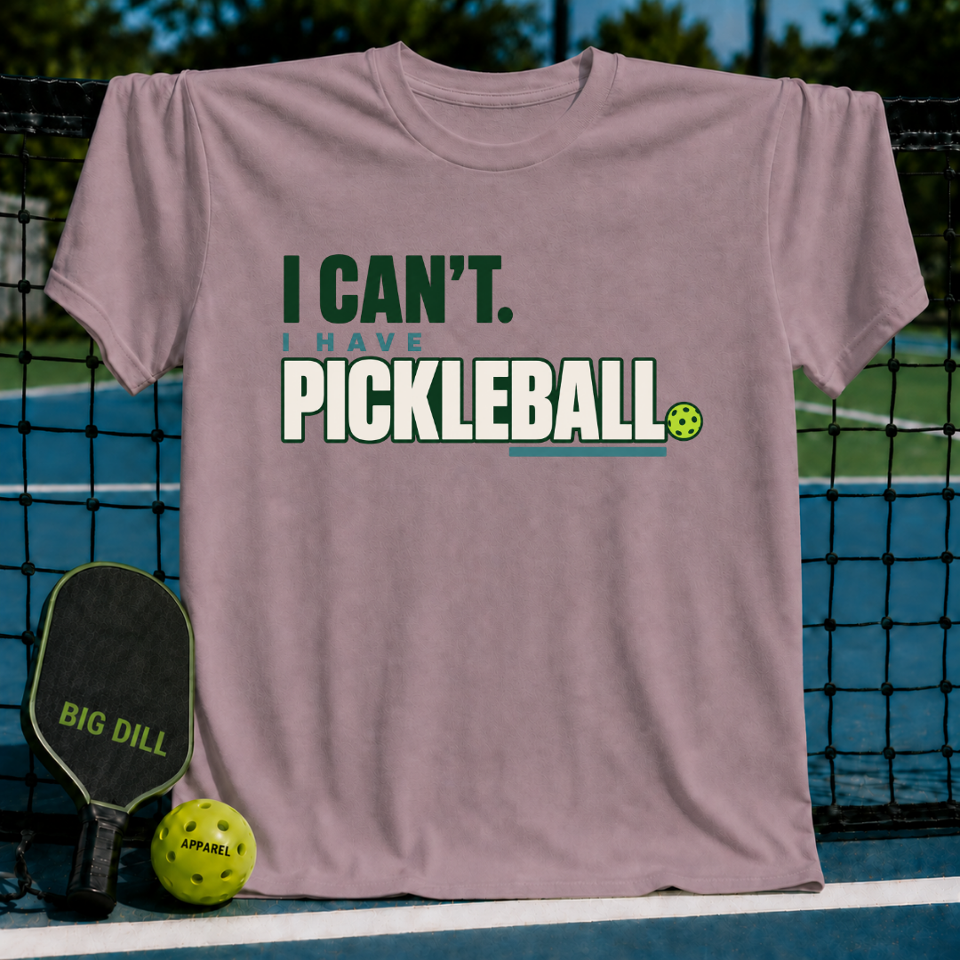 Mauve crewneck t-shirt featuring the text I Can't I Have Pickleball with a small pickleball graphic on a court.