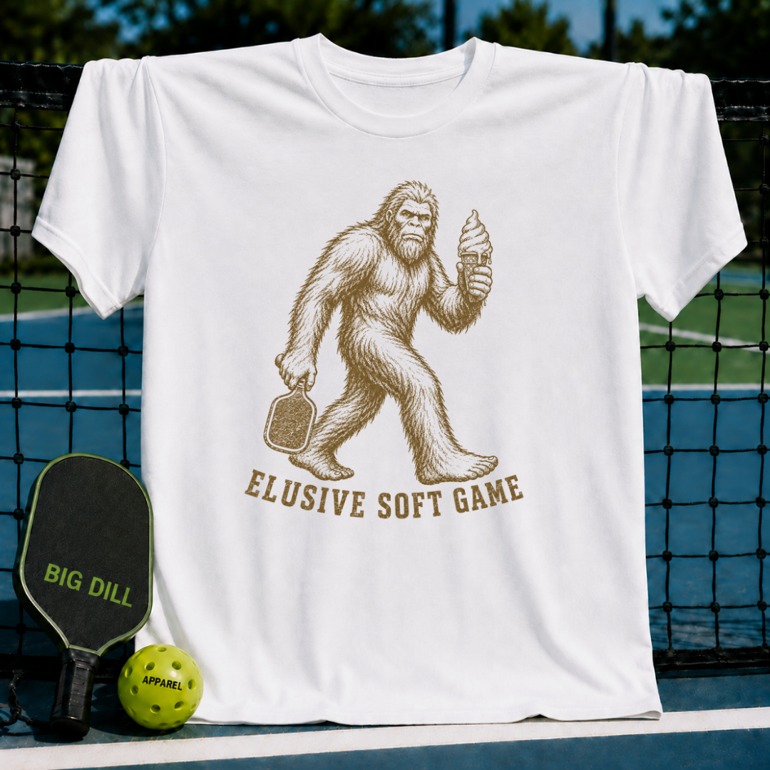 White unisex t-shirt featuring a vintage Sasquatch graphic with a pickleball paddle and melting ice cream cone.