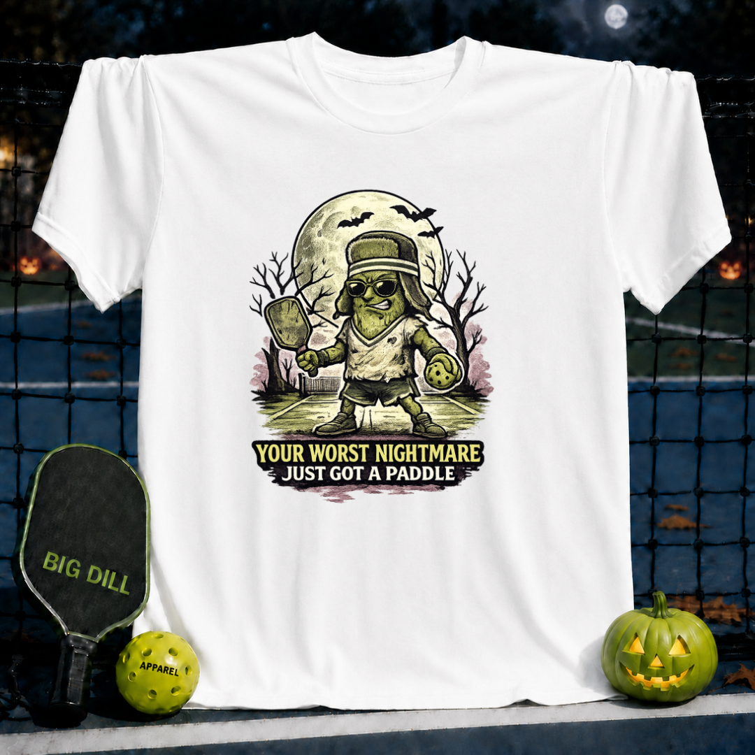 White unisex t-shirt featuring a Frankenstein pickleball player graphic with the text Your Worst Nightmare Just Got A Paddle.