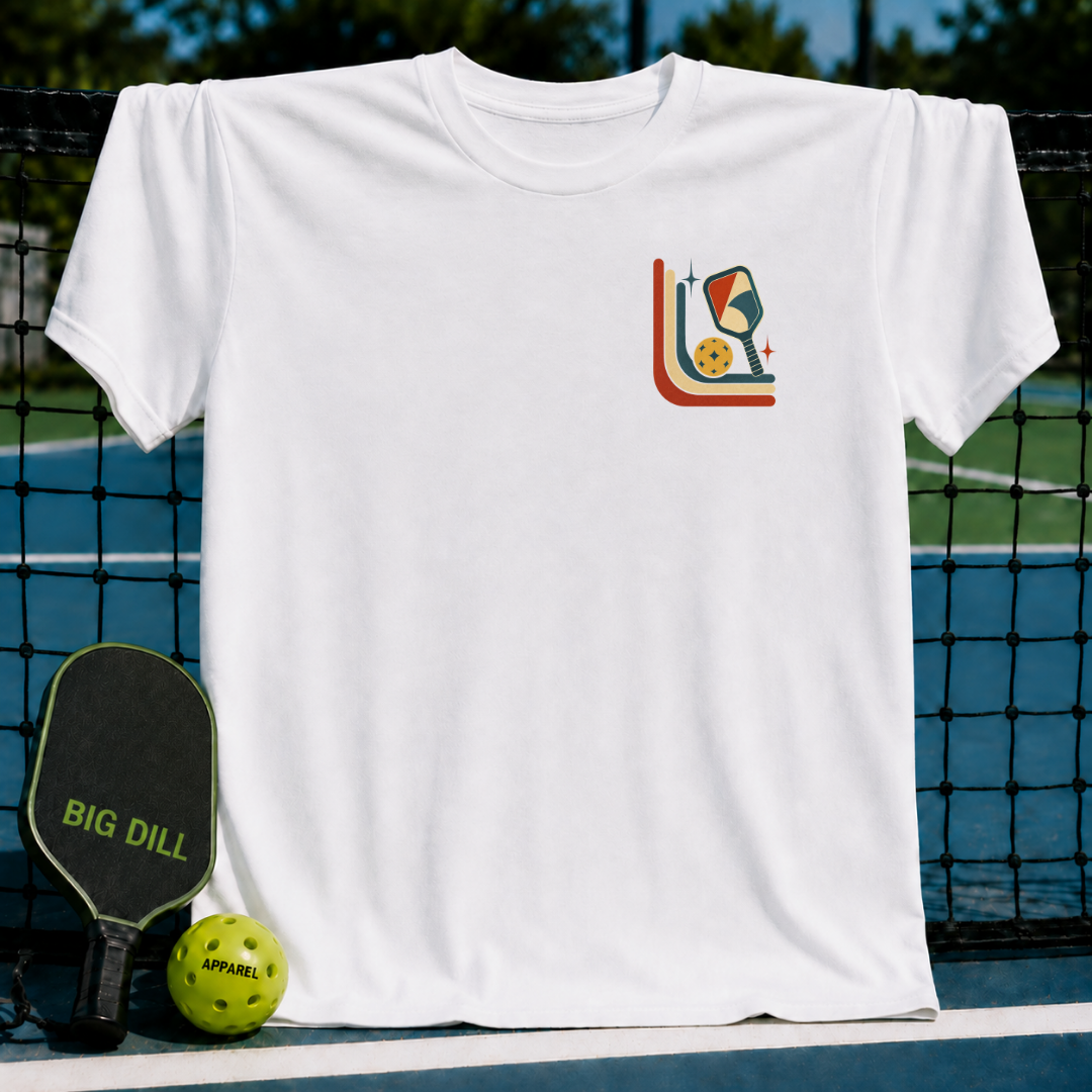 White unisex t-shirt featuring a mid-century retro pickleball graphic with stars and curves on a pickleball court background.