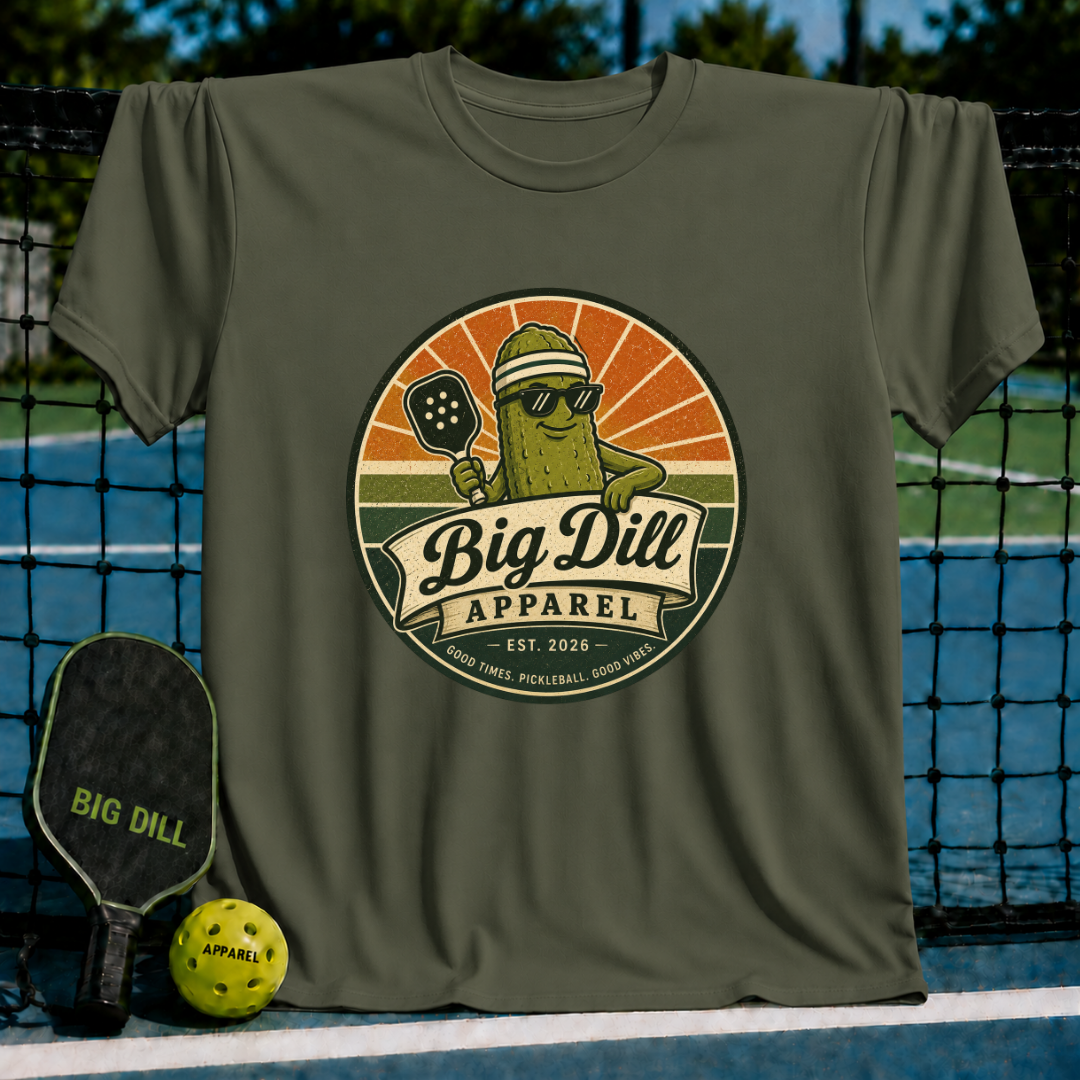 Military olive green unisex t-shirt featuring a retro pickleball mascot graphic inside a circular badge.