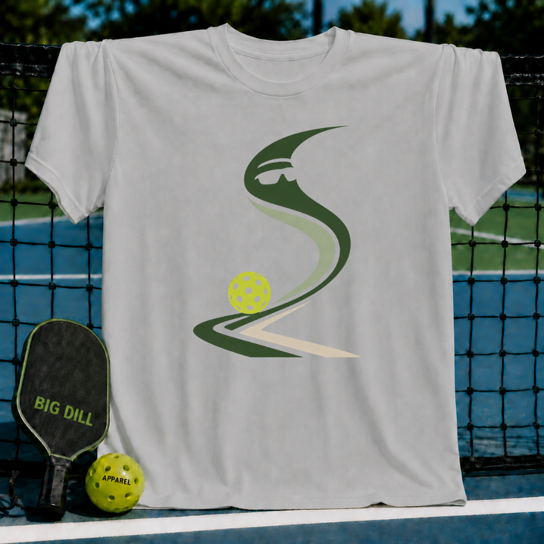 Light gray crew neck t-shirt featuring a stylized green pickleball graphic on a pickleball court background.