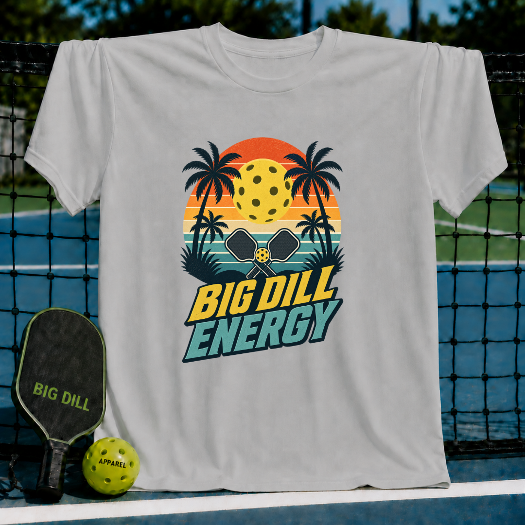 Light gray crew neck t-shirt featuring a retro sunset, palm trees, and Big Dill Energy pickleball graphic.
