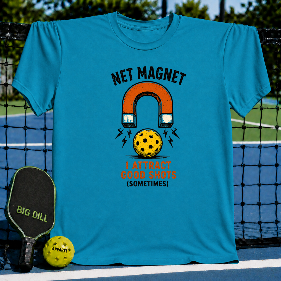 Blue unisex t-shirt featuring a vintage horseshoe magnet and pickleball graphic with the text Net Magnet Good Shots.