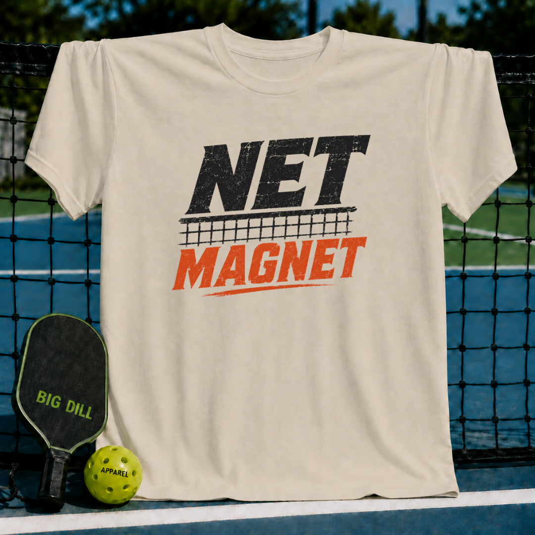 Beige unisex t-shirt featuring a distressed black and orange Net Magnet graphic with a pickleball net design.