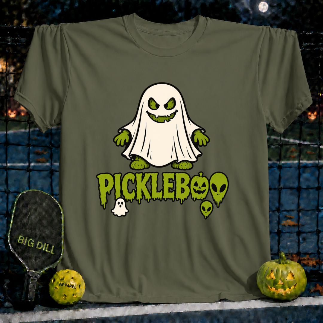 Military green unisex PickleBoo t-shirt featuring a spooky ghost pickle graphic with Halloween text on a pickleball court.