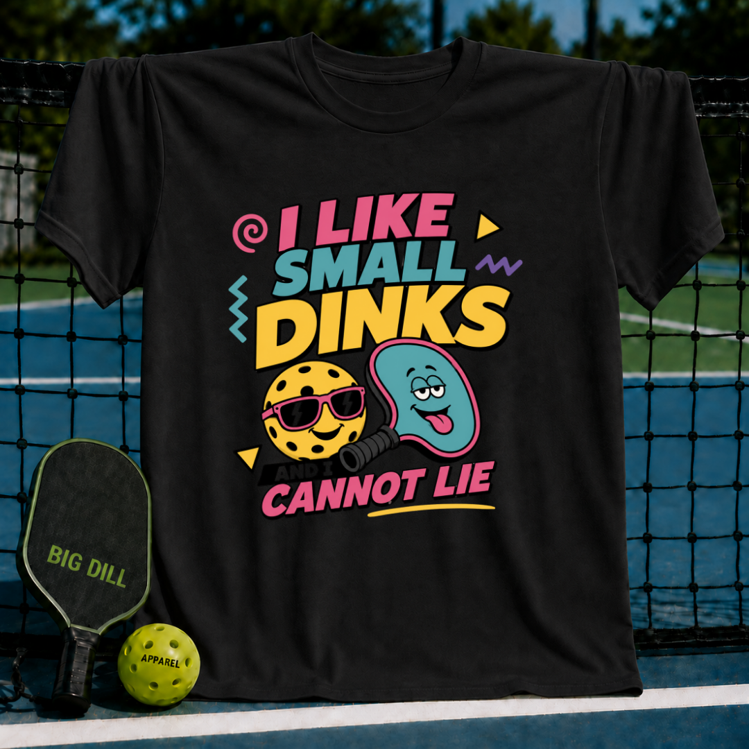 Black cotton t-shirt featuring a colorful retro-style pickleball graphic with the text I Like Small Dinks And I Cannot Lie.