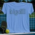 Light blue unisex t-shirt featuring a bold, black outline Big Dill wordmark, displayed on a pickleball court net.