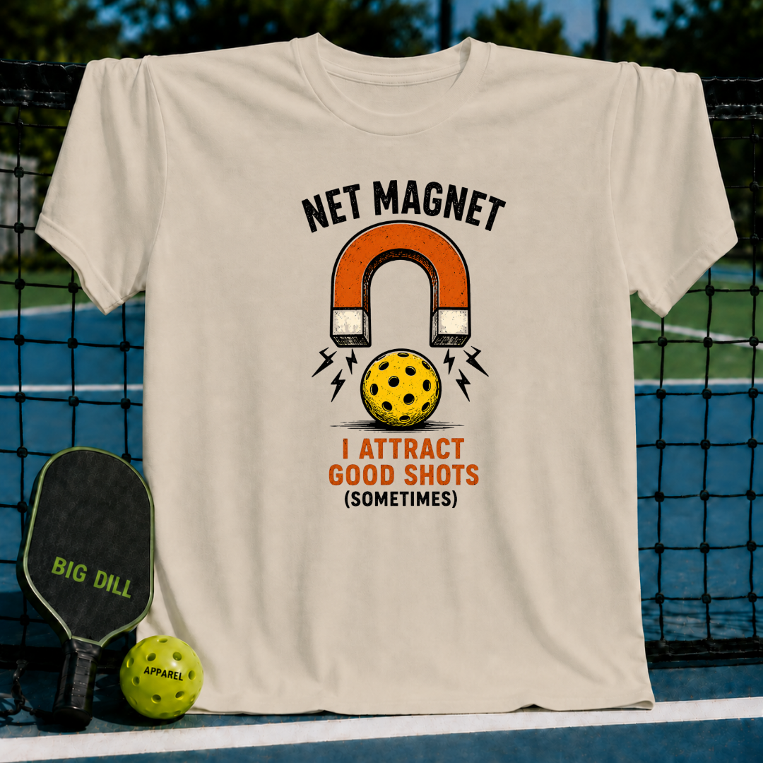 Light beige unisex t-shirt featuring a retro horseshoe magnet and yellow pickleball graphic with Net Magnet text.