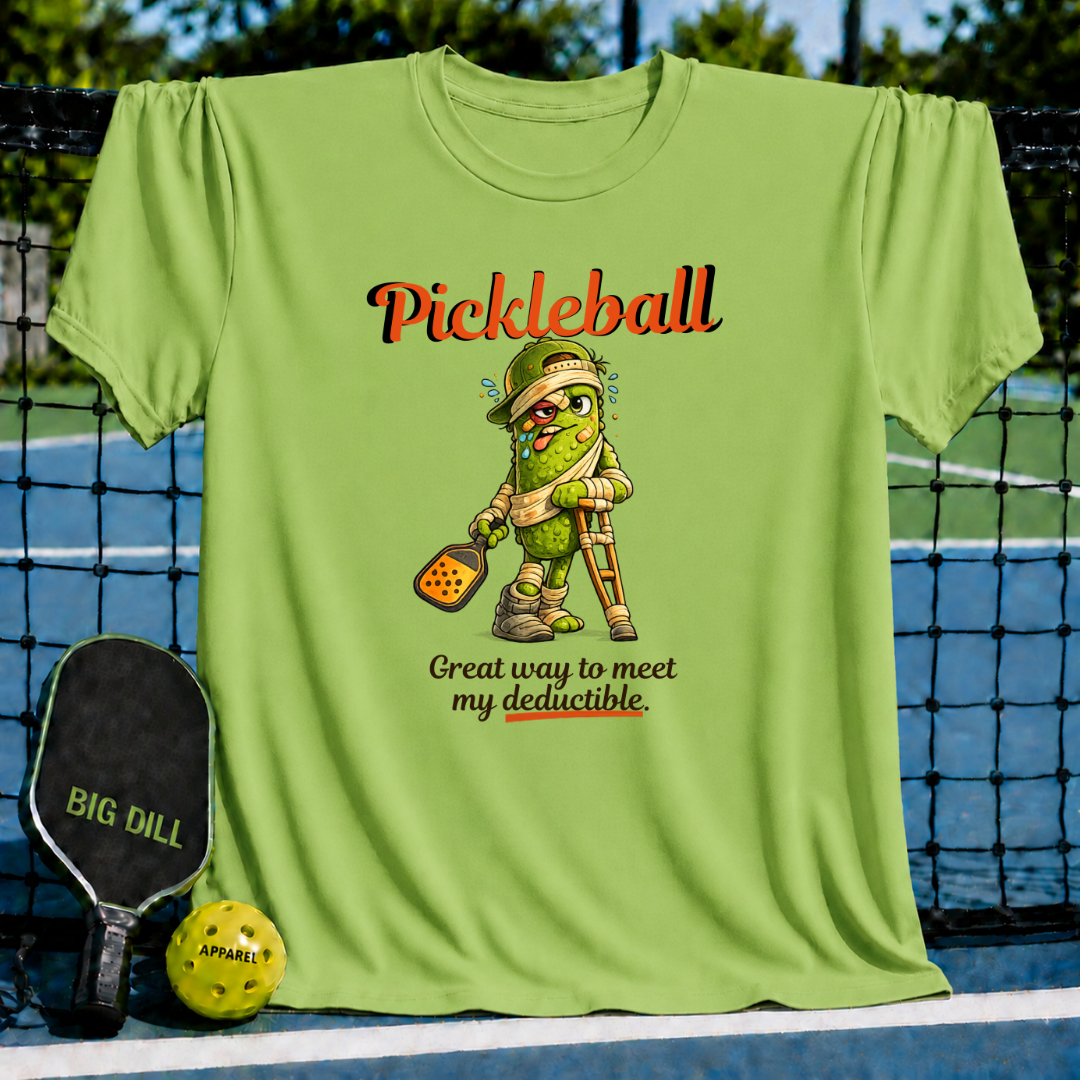 Light green unisex t-shirt featuring a cartoon pickle on crutches with the text Pickleball: Great way to meet my deductible.