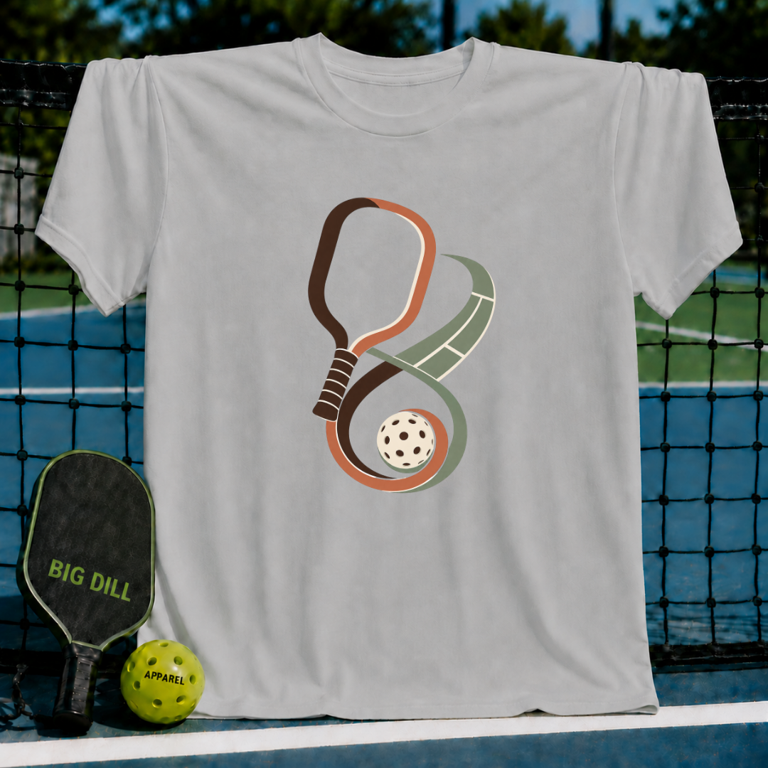 Light gray crew neck t-shirt featuring an infinity-shaped pickleball paddle and court graphic with a ball.