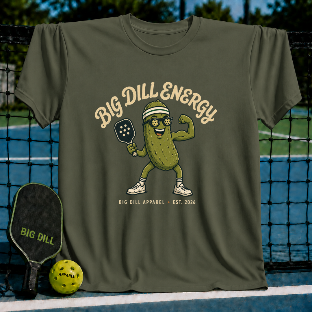 Military olive unisex t-shirt featuring a pickle mascot with sunglasses, visor, and paddle, with Big Dill Energy text.