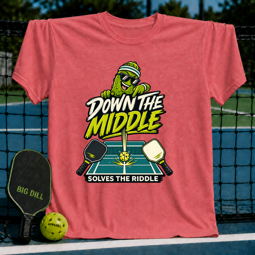 Coral pink t-shirt featuring a cartoon pickle character playing pickleball with the text Down the Middle Solves the Riddle.