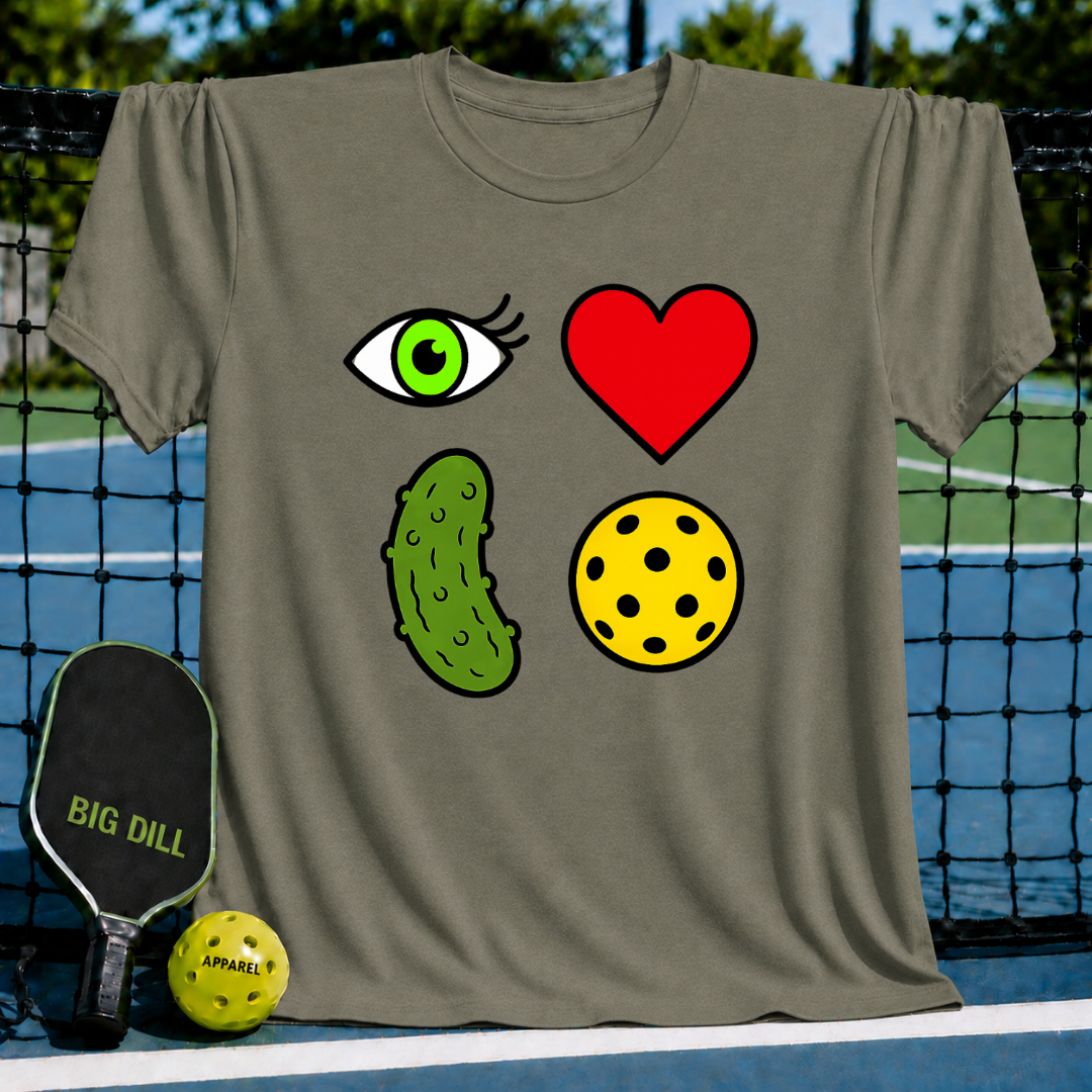 Olive green unisex t-shirt featuring a 2x2 rebus graphic of an eye, heart, pickle, and pickleball on a court.