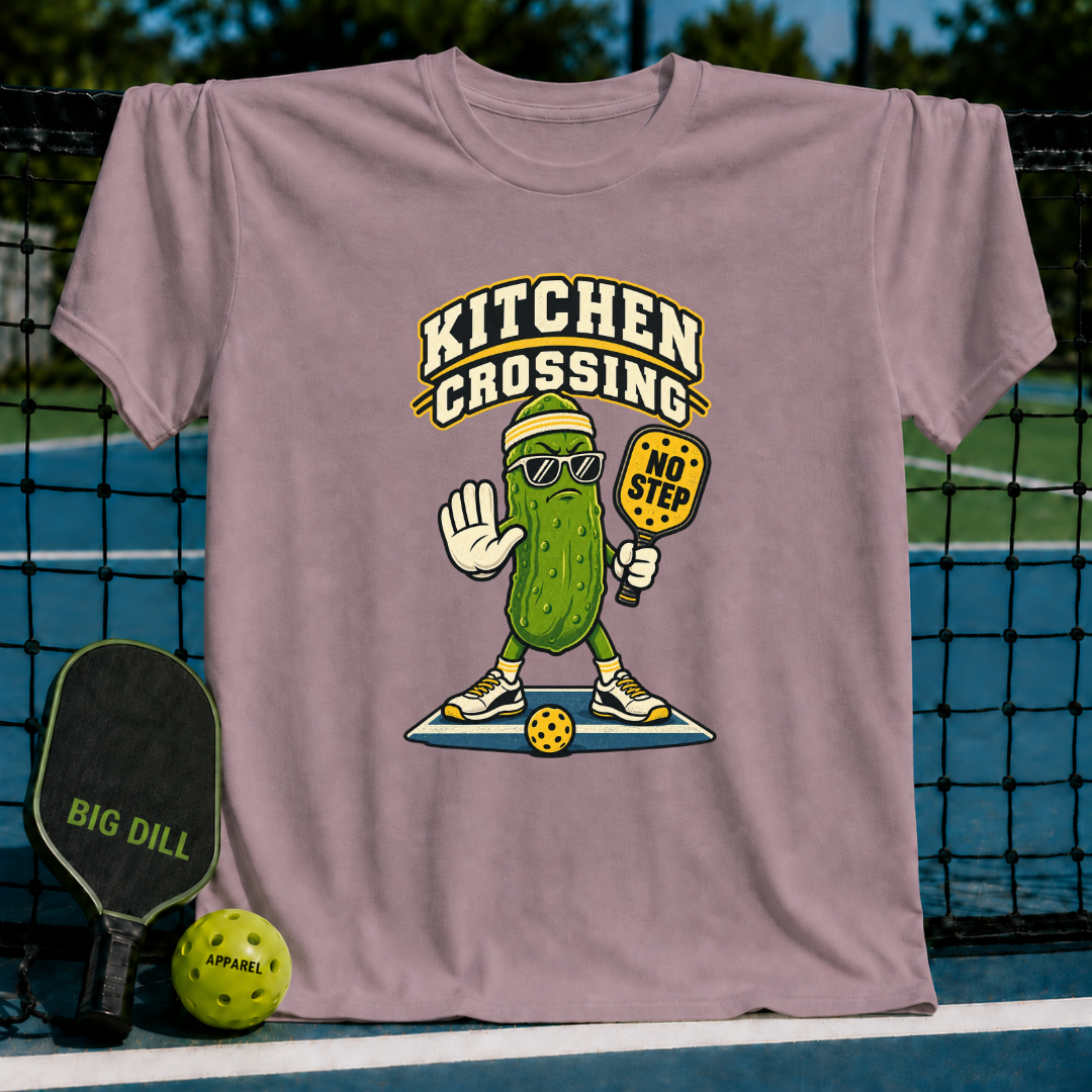 Mauve crewneck t-shirt featuring a pickleball-playing pickle graphic with sunglasses and a No Step paddle design.