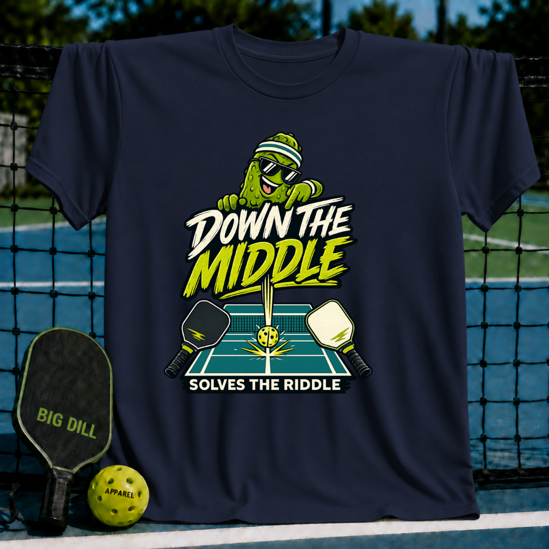 Navy blue crew neck t-shirt featuring a pickleball-themed graphic with a cartoon pickle, paddles, and court design.