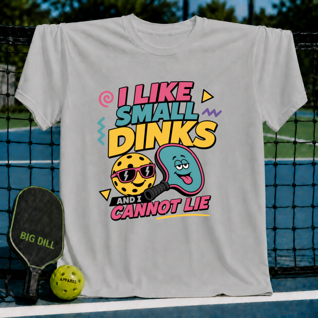 Light grey crew neck t-shirt featuring a colorful pickleball graphic with the text I Like Small Dinks and I Cannot Lie.