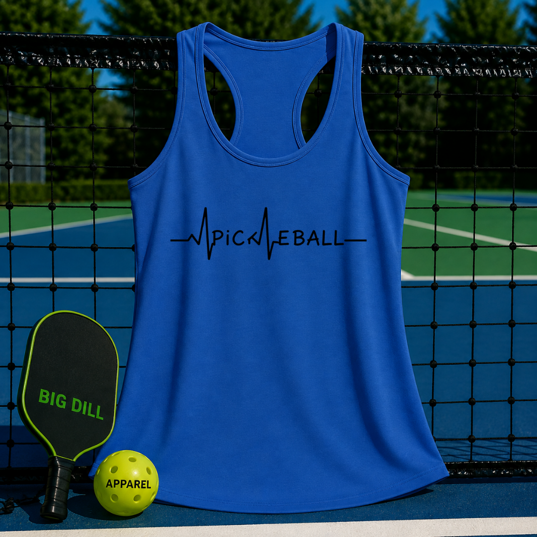 Blue racerback tank top with a black Pickleball EKG graphic, displayed on a pickleball court with a paddle and ball.