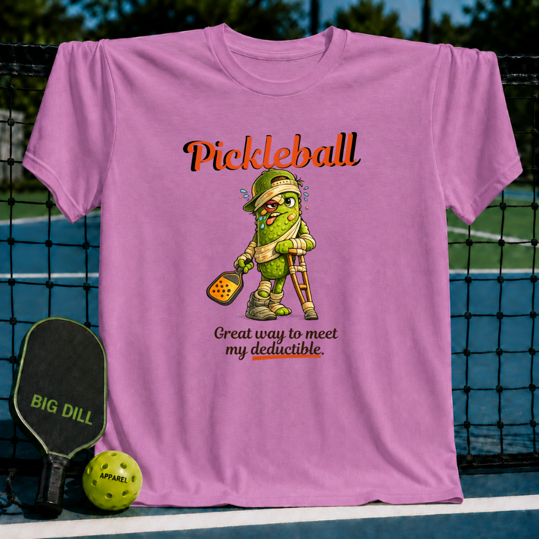 Pink unisex t-shirt featuring a cartoon pickle on crutches with a paddle and the text Pickleball: Great way to meet my deductible.
