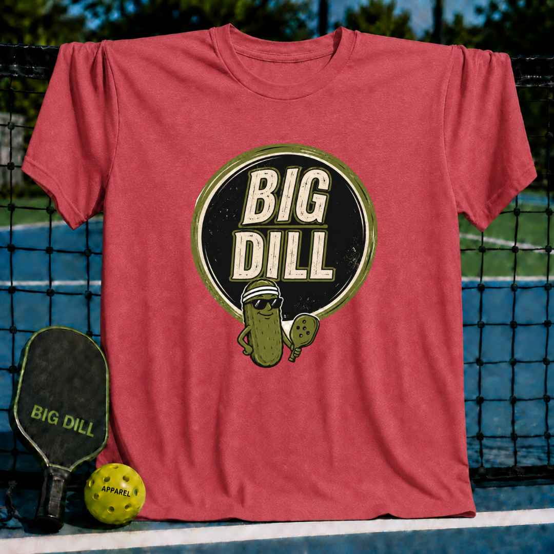 Red crewneck t-shirt featuring a Big Dill pickle character graphic with sunglasses and a pickleball paddle.