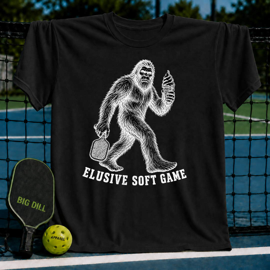 Black unisex t-shirt featuring a vintage Sasquatch graphic holding a pickleball paddle and a melting ice cream cone.