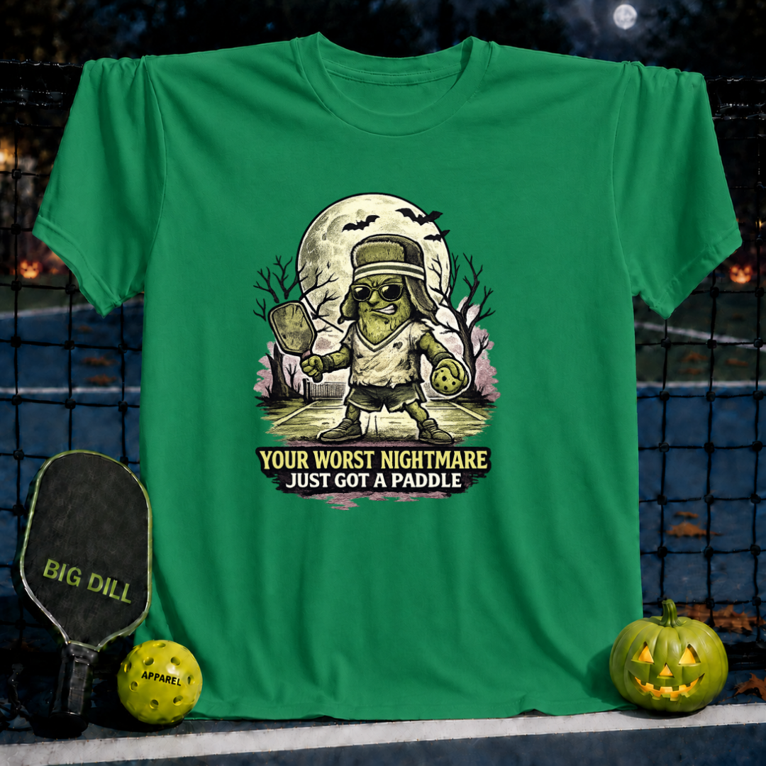 Kelly green unisex t-shirt featuring a Frankenstein pickleball player graphic with the text Your Worst Nightmare Just Got A Paddle.