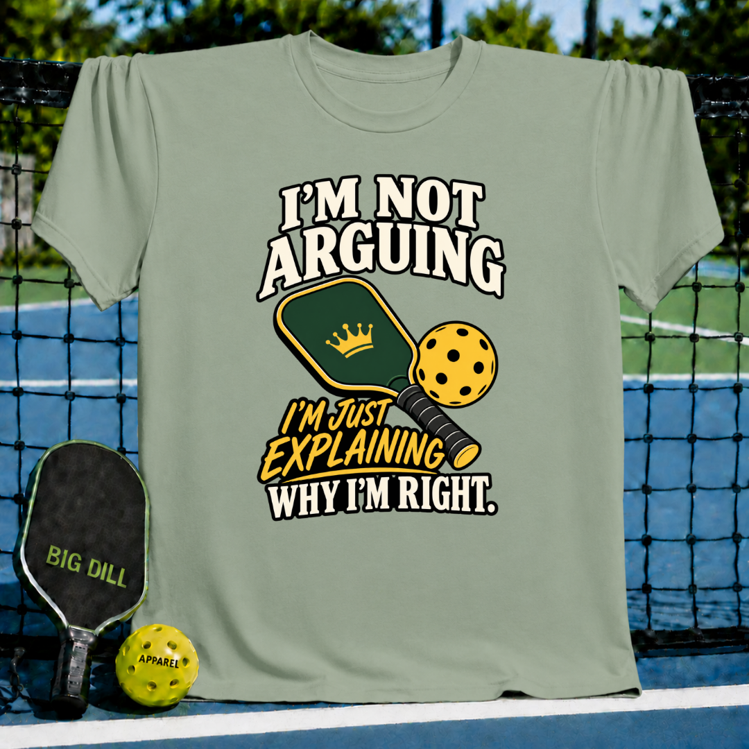 Sage green cotton t-shirt featuring a pickleball paddle and ball graphic with the text I'm Not Arguing I'm Just Explaining.