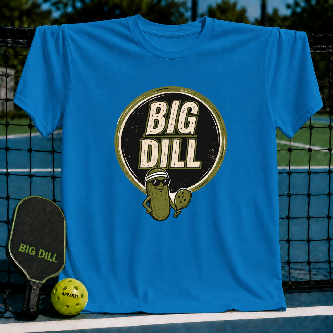 Bright blue Big Dill 4 t-shirt featuring a pickle graphic with sunglasses and a pickleball paddle on a court background.
