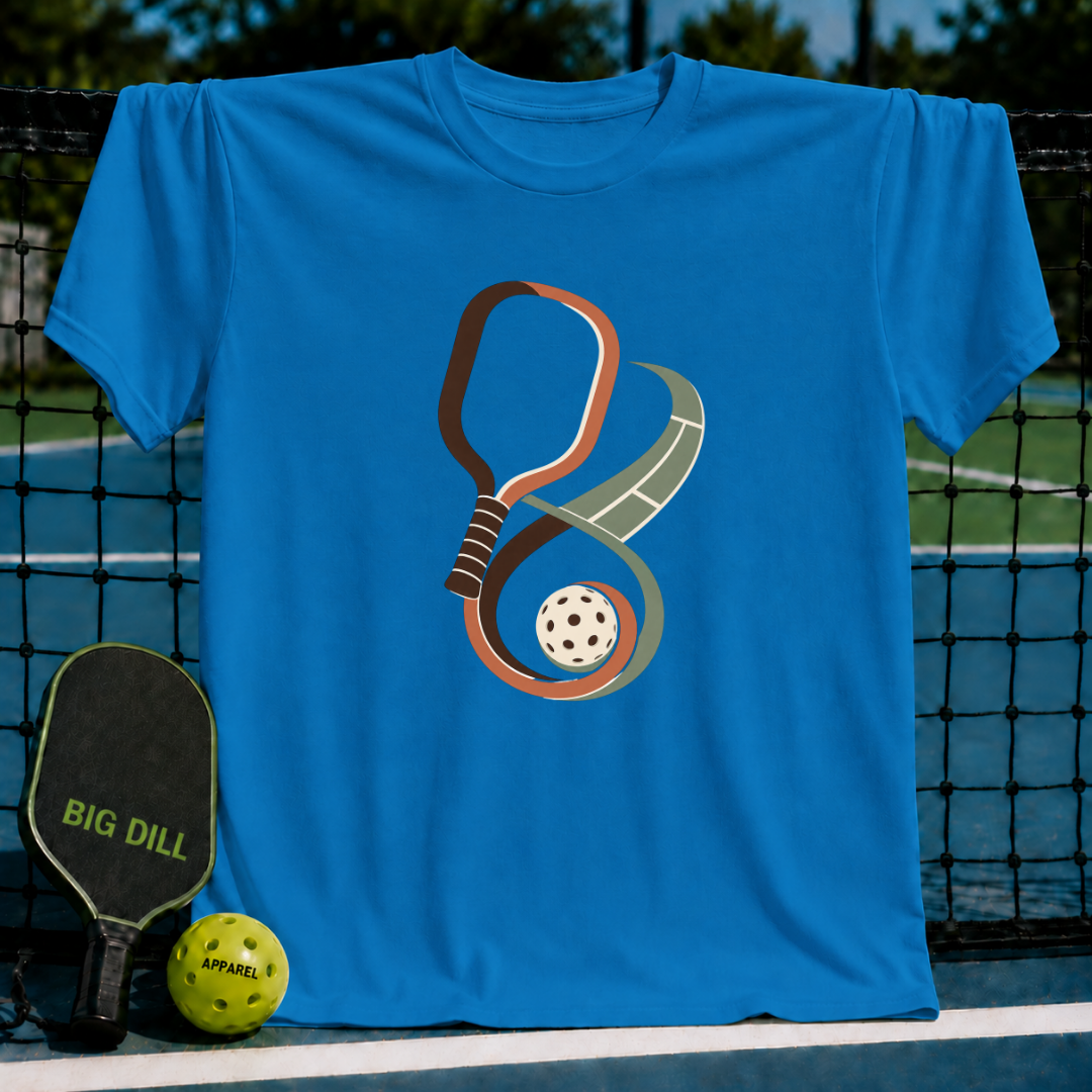 Bright blue crewneck t-shirt featuring a stylized infinity symbol made of a pickleball paddle and ball graphic.
