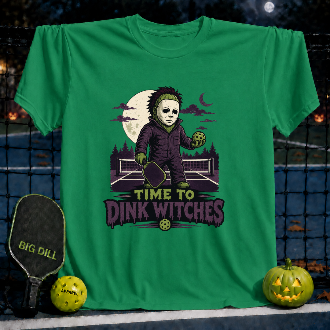 Kelly green unisex pickleball t-shirt featuring a spooky Halloween graphic with a masked player and Time to Dink Witches text.
