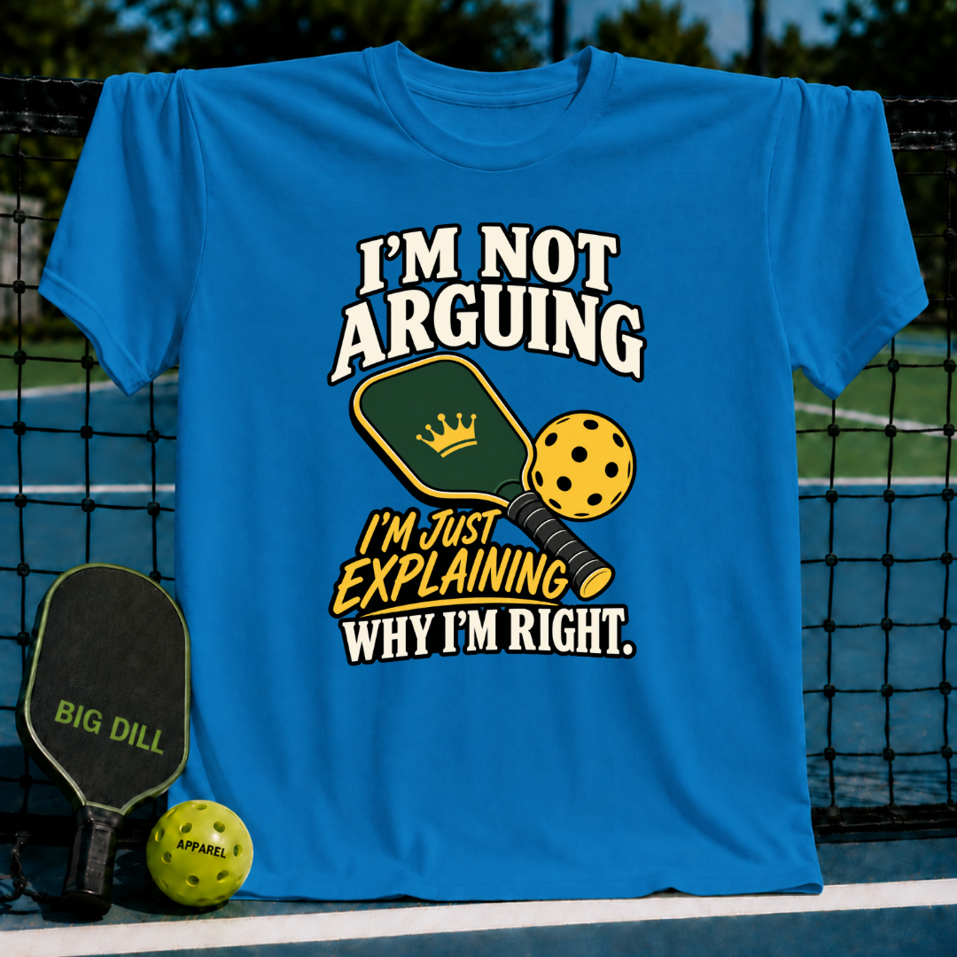 Bright blue crewneck T-shirt featuring a pickleball graphic with the text I'm Not Arguing I'm Just Explaining Why I'm Right.
